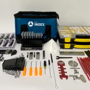 An Index Machine Toolkit with various tools and items essential for capsule filler operation and maintenance.
