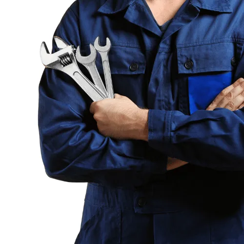 Field service technician holding three wrenches.