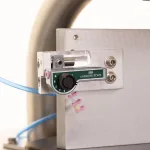 Close up shot of the tensioner of the FW-5050 Floss Winder.